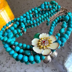 3 strand turquoise necklace with flower broach detail